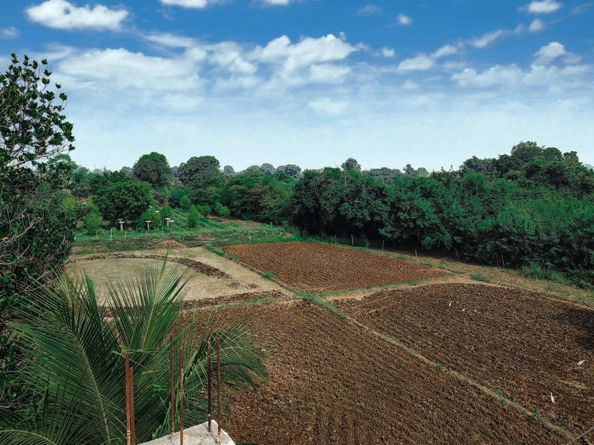 V J Farmstay Garudeshwar ภายนอก รูปภาพ