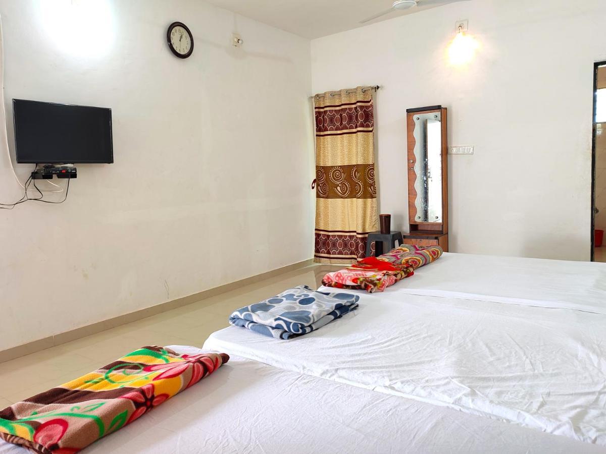 V J Farmstay Garudeshwar ภายนอก รูปภาพ